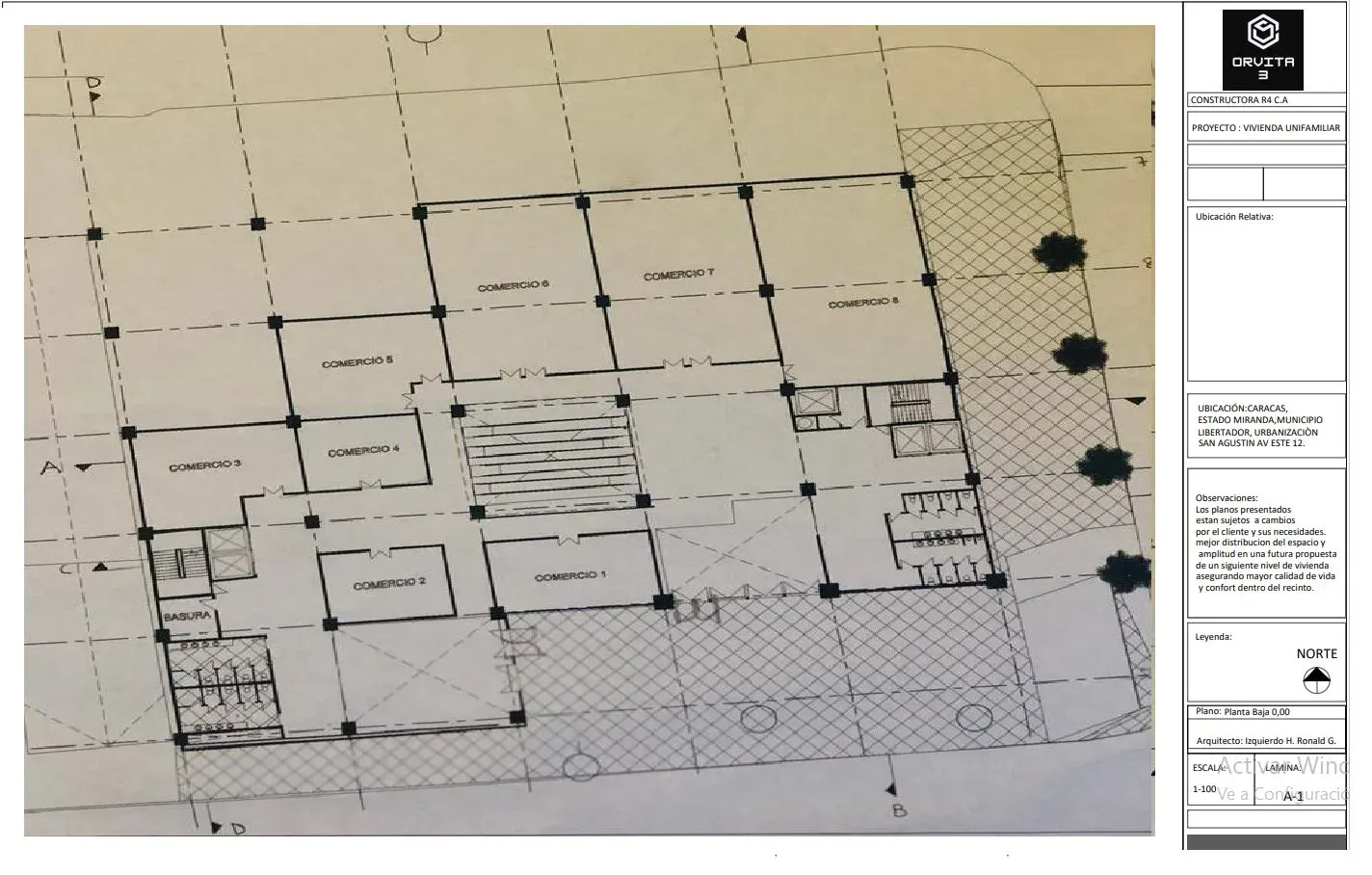 Planta P1 del edificio 369 dibujada a mano, con locales comerciales alrededor de un núcleo central de circulación